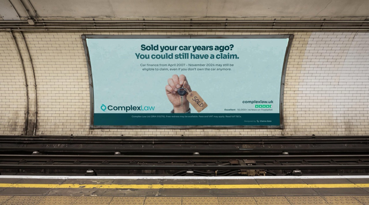 Cross-track poster on a Tube platform: “Sold your car years ago? You could still have a claim.”
